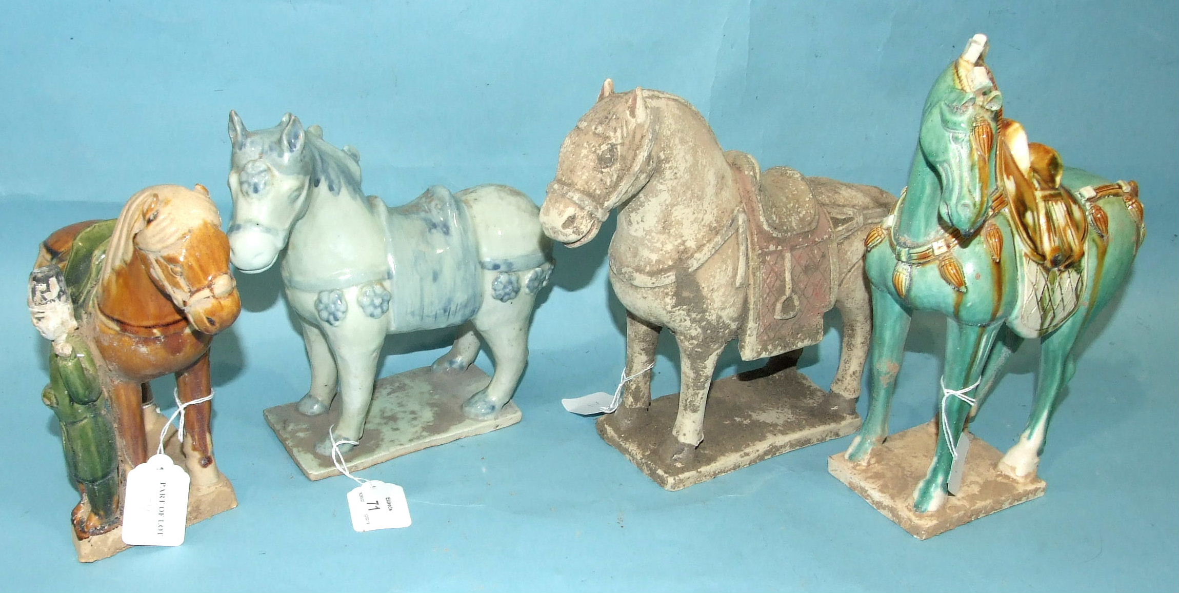 Four small Tang-style earthenware horses with sancai glazes, (4).