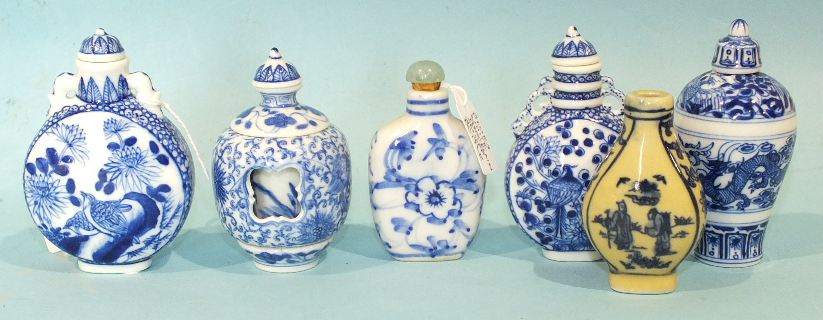 Six small blue and white porcelain Chinese snuff bottles and stoppers, (6).