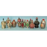 Twelve metal-mounted Oriental snuff bottles in various materials, (12).
