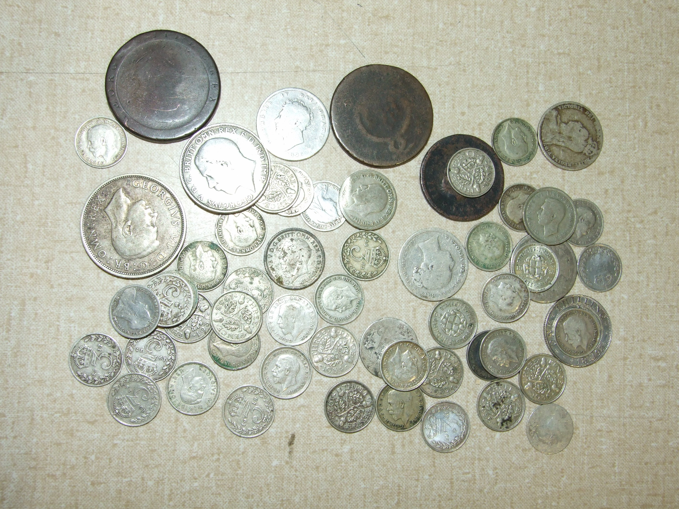 A collection of British and foreign coins, includes a small quantity of pre-1947 silver. - Image 2 of 2