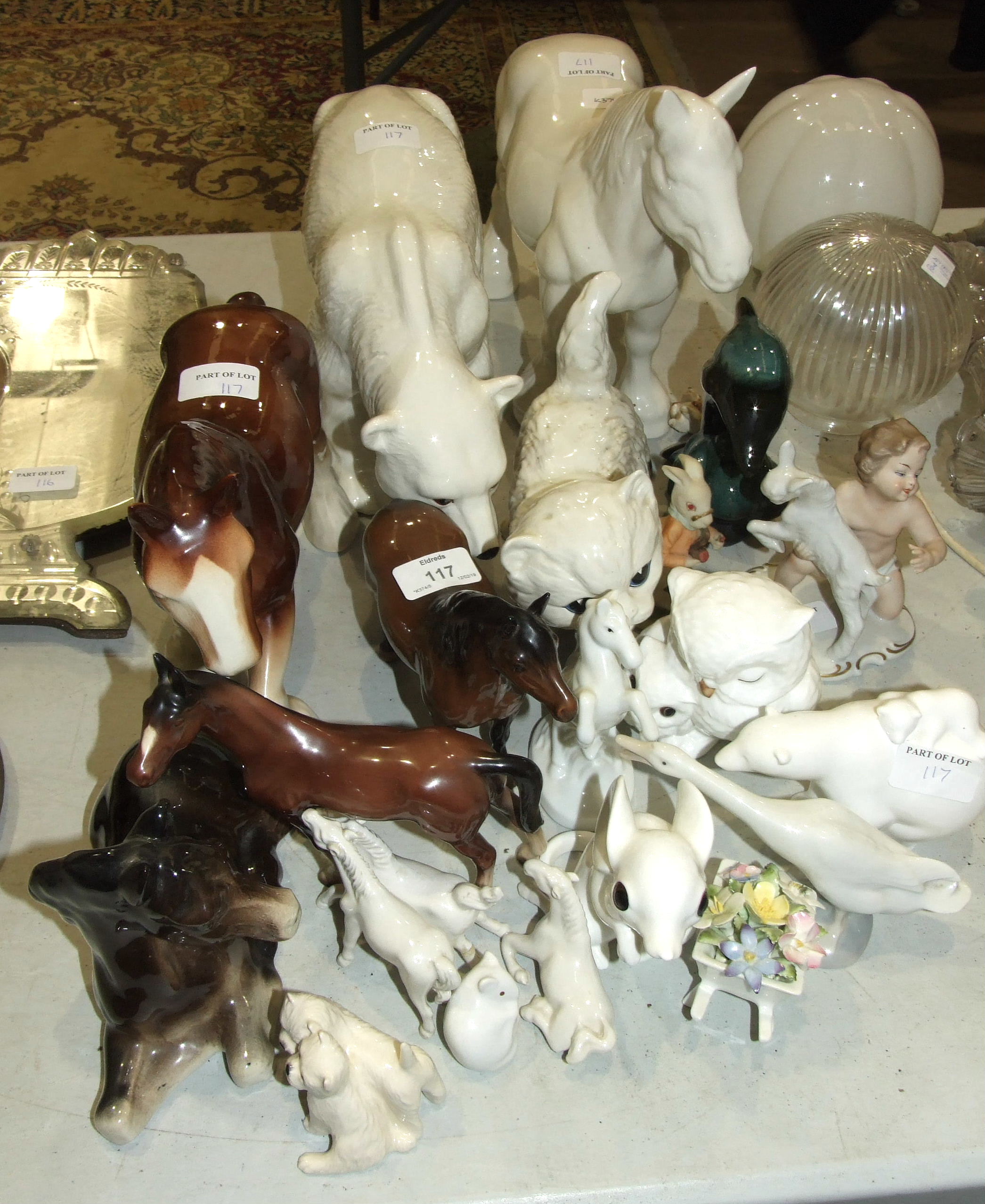 A Beswick model 'Dartmoor Pony', 16cm high, another 'West Highland Terriers - seated' and other