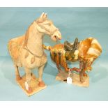 Two Tang-style earthenware horses, one unglazed with enamel decoration, (2).