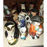 A collection of nine 19th century and later ceramic Toby jugs and two others, (damages and