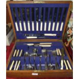 A part-set of James Dixon & Son plated cutlery, in oak fitted case.