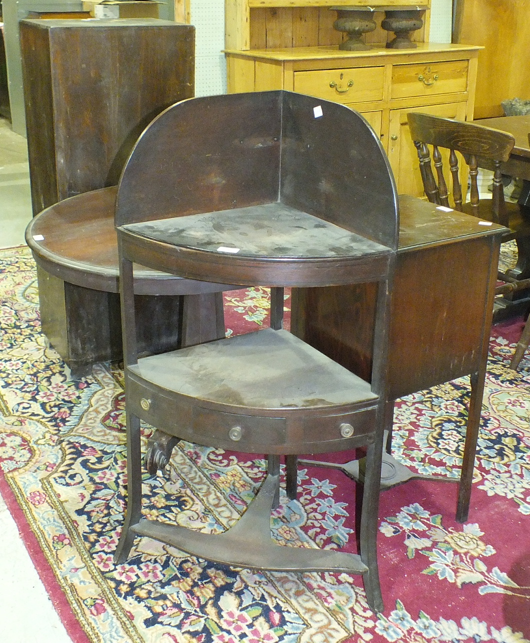 A Georgian mahogany corner wash stand, 56cm wide, a mahogany square-top pot cupboard and other