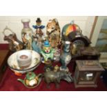 A Hermle wooden chiming mantel clock, 31cm high, various modern ceramic figure ornaments, two Murano