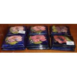 A collection of twelve Moorcroft rectangular blue-glazed lids, each 12.5 x 9cm, eight decorated with