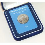 A Franklin Mint 1976 cased 150-Balboa platinum coin.