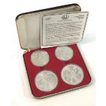 Canada 1976 Olympic silver four-coin set in original case, Series IV Olympic Track and Field