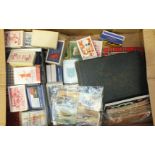 A small collection of cigarette and trade cards, (part-sets), various packs of playing cards and