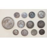 Twelve George III silver coins: crown 1819 (LX), shilling 1816/17/19/20, sixpence 1787, 1817 (x2),