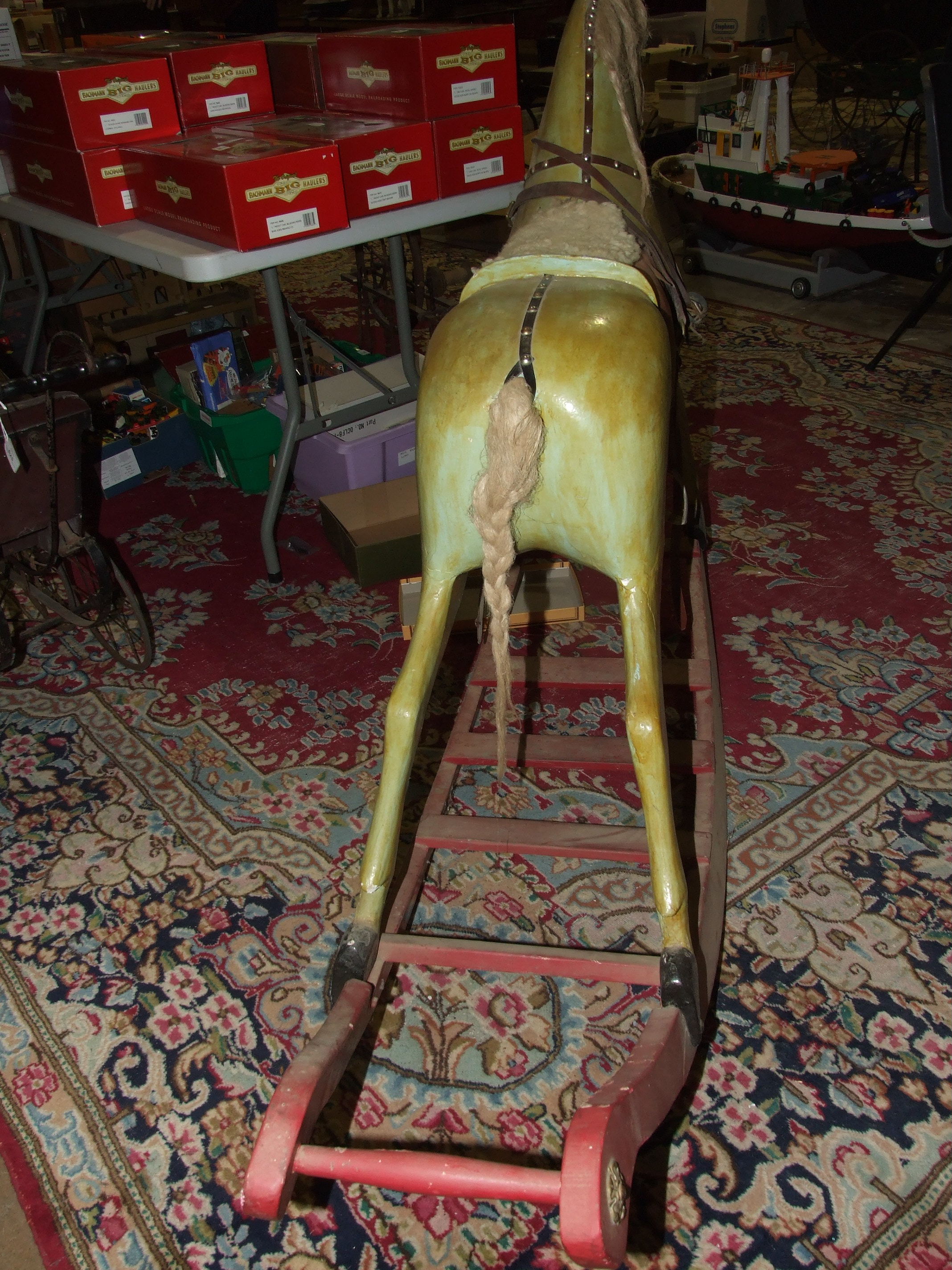 An early-20th century painted wood rocking horse on painted sleigh base and fitted with leather - Image 4 of 4