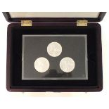 A Westminster silver proof £5 three-coin set A Tribute to the Armed Services, in fitted case and