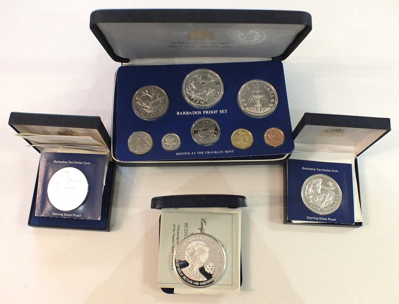 A Franklin Mint cased 1976 British Virgin Islands proof set, a 1976 Coinage of Barbados eight-coin