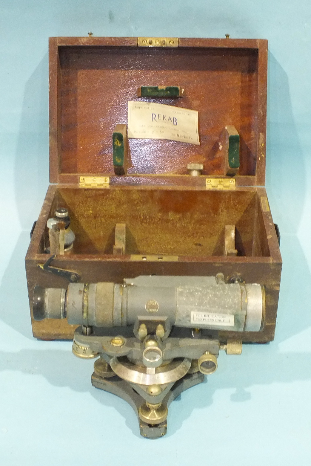 C Baker, London, a painted bronze theodolite, numbered 501125, in original fitted box.