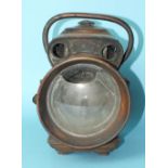 A Jos Lucas Ltd "Autolite" brass carbide car lamp numbered 594, 27cm high, (domed glass broken,