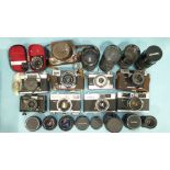 Eight various SLR cameras including Bessamatic, Konica, Ricoh and ten assorted lenses.