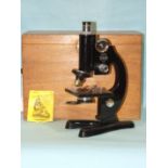 Beck, London, a monocular microscope, model 47, numbered 22718, in case.