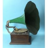 An early-20th century oak-cased horn table-top gramophone with painted pressed tin horn, base 37 x