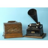 A Thomas A Edison Gem phonograph, numbered G135514, with 12cm cylinder, key, tin horn and oak case