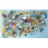 A quantity of glass marbles, 175 in total and a small quantity of Bakelite balls.