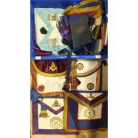 A collection of aprons, collars and Masonic ritual and constitution books, (all in soiled