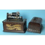 A Columbia Phonograph Co. Graphophone type AT, numbered 244053, (no horn), with lid, 30 x 20 x