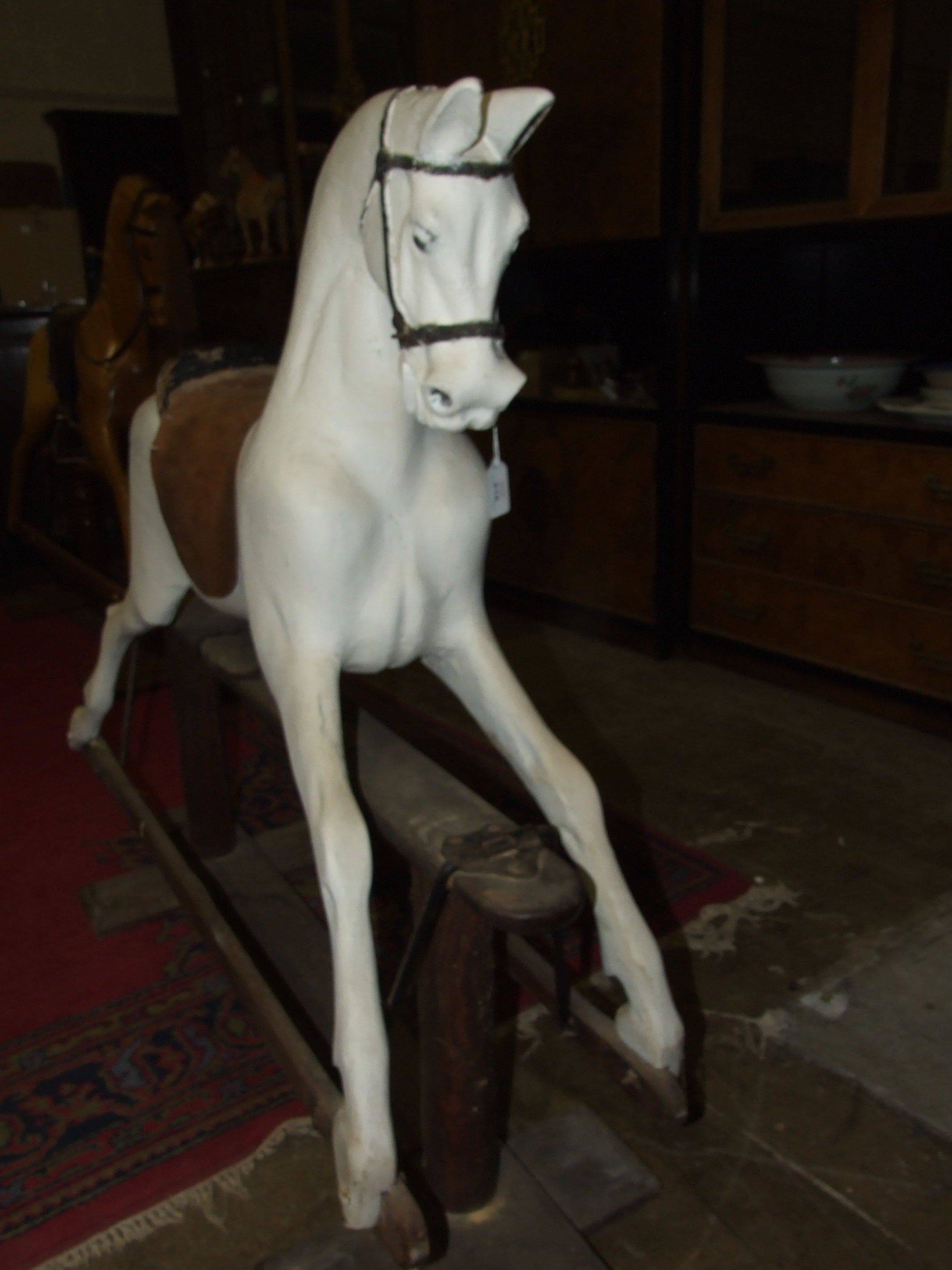 An early-20th century rocking horse on pine trestle, (a/f, re-painted, no mane or tail), 110cm high, - Image 4 of 4