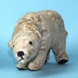 An early-to-mid-20th century polar bear, possibly by Gebruder Hermann, the wood wool-stuffed body