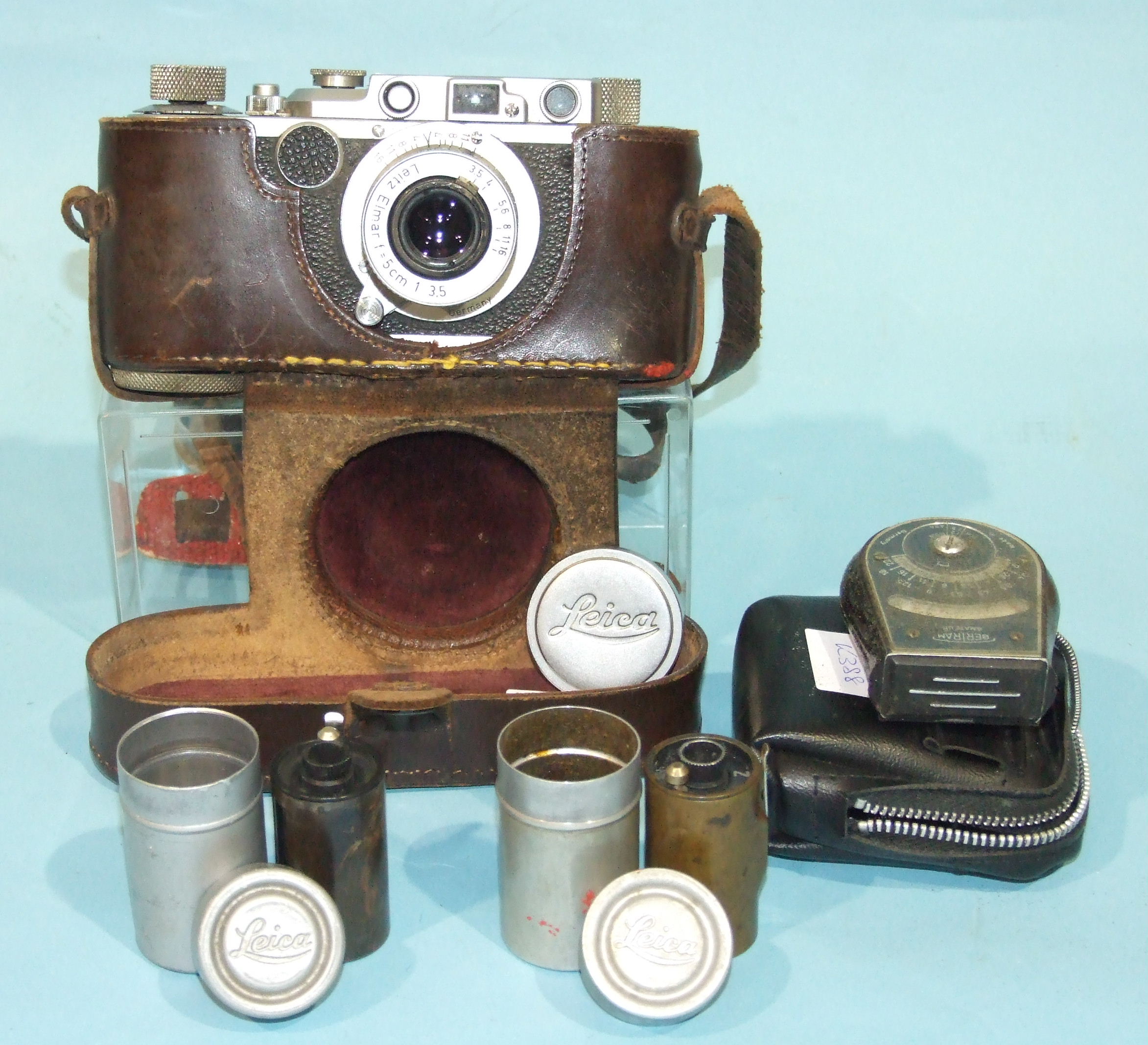 A Leica II Rangefinder camera no.241636, with Leitz Elmar f=5cm, 1:3.5 lens, in leather case, with