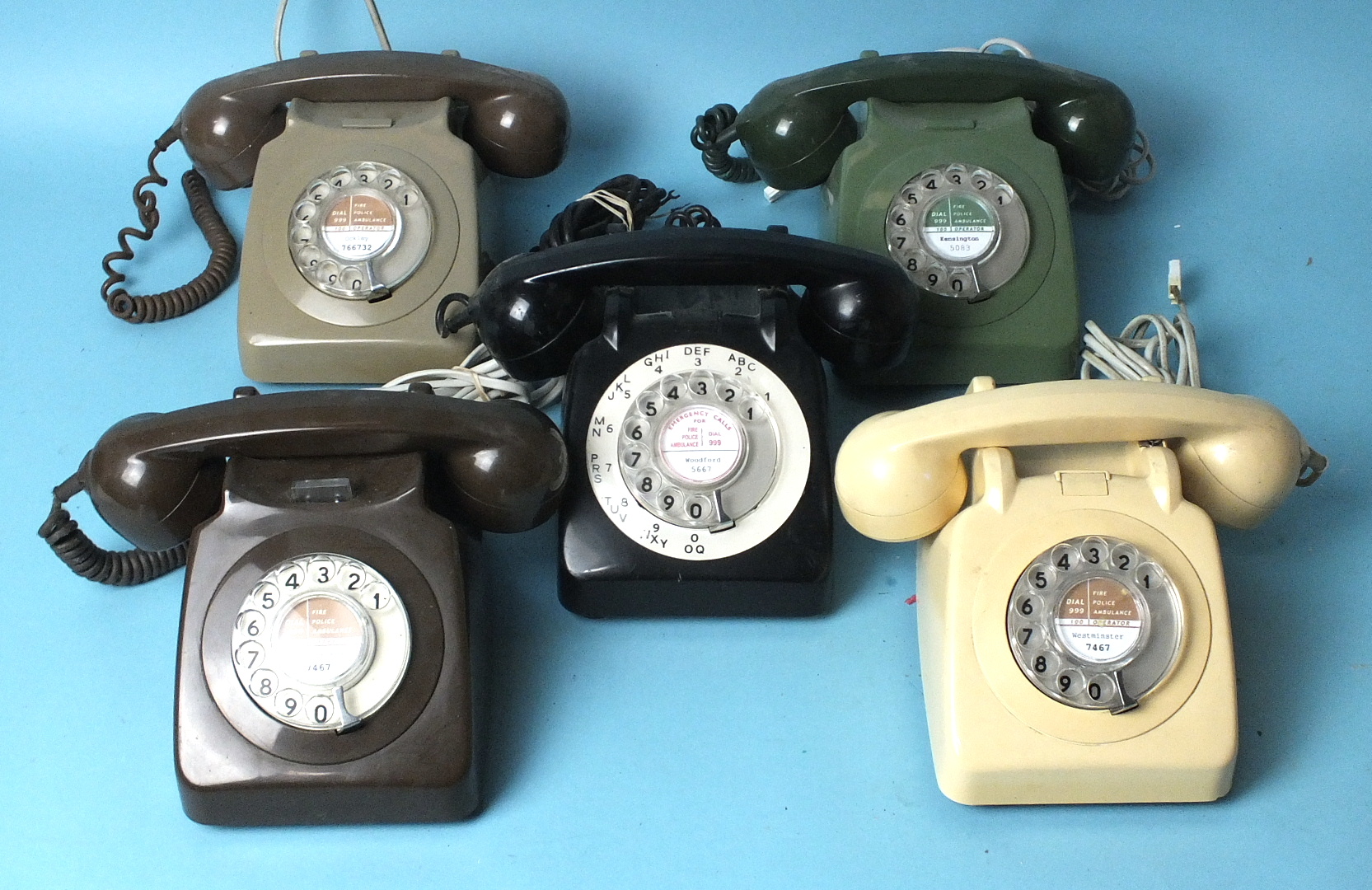 Five British Telecom plastic telephones, (5).