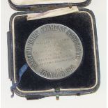 A silver British Dairy Farmer's Association medal, London 1925, with inscription, ___1.8oz, in