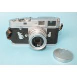 A Leica M2 Rangefinder camera 1963, no.1087195, with Leitz Wetzlar Elmar 1:2.8/50 lens no.2119784