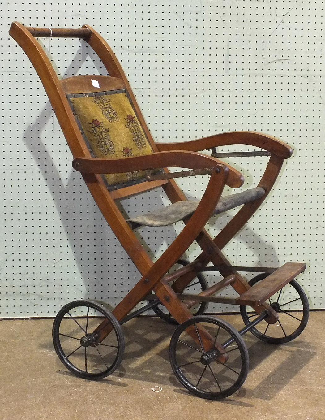 An Edwardian folding push chair with upholstered chenille back and spoked wheels, 82cm high. - Image 2 of 2