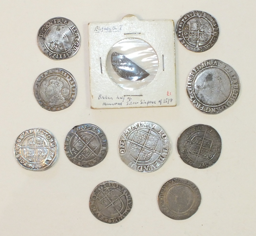 A collection of ten Elizabeth I hammered silver coins: shilling (x2), sixpence (x8), (a/f), (10).