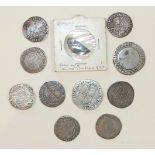 A collection of ten Elizabeth I hammered silver coins: shilling (x2), sixpence (x8), (a/f), (10).