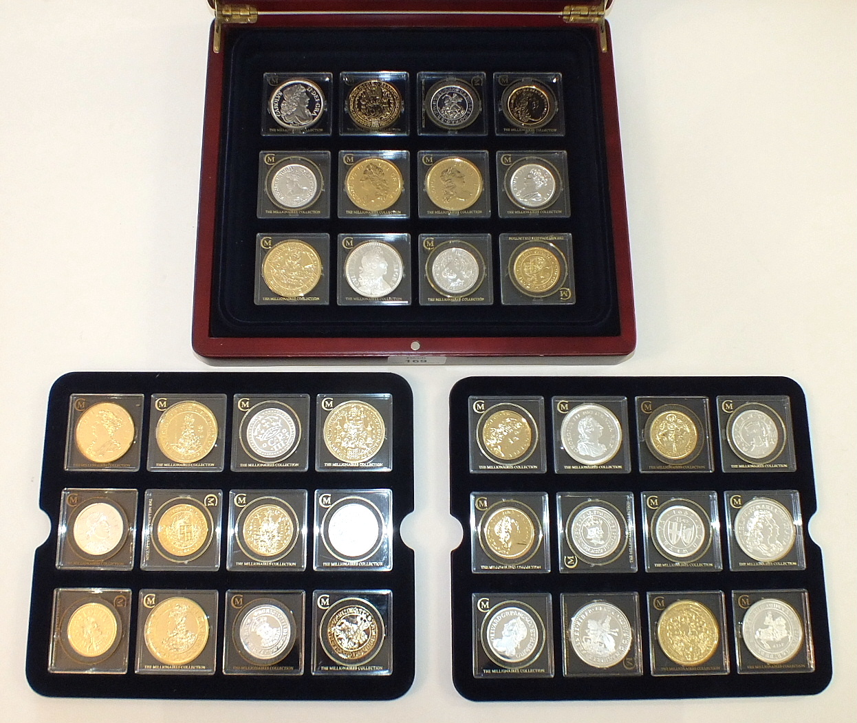 London Mint, "The Millionaires Collection", containing thirty-six silver and silver gilt coins, in