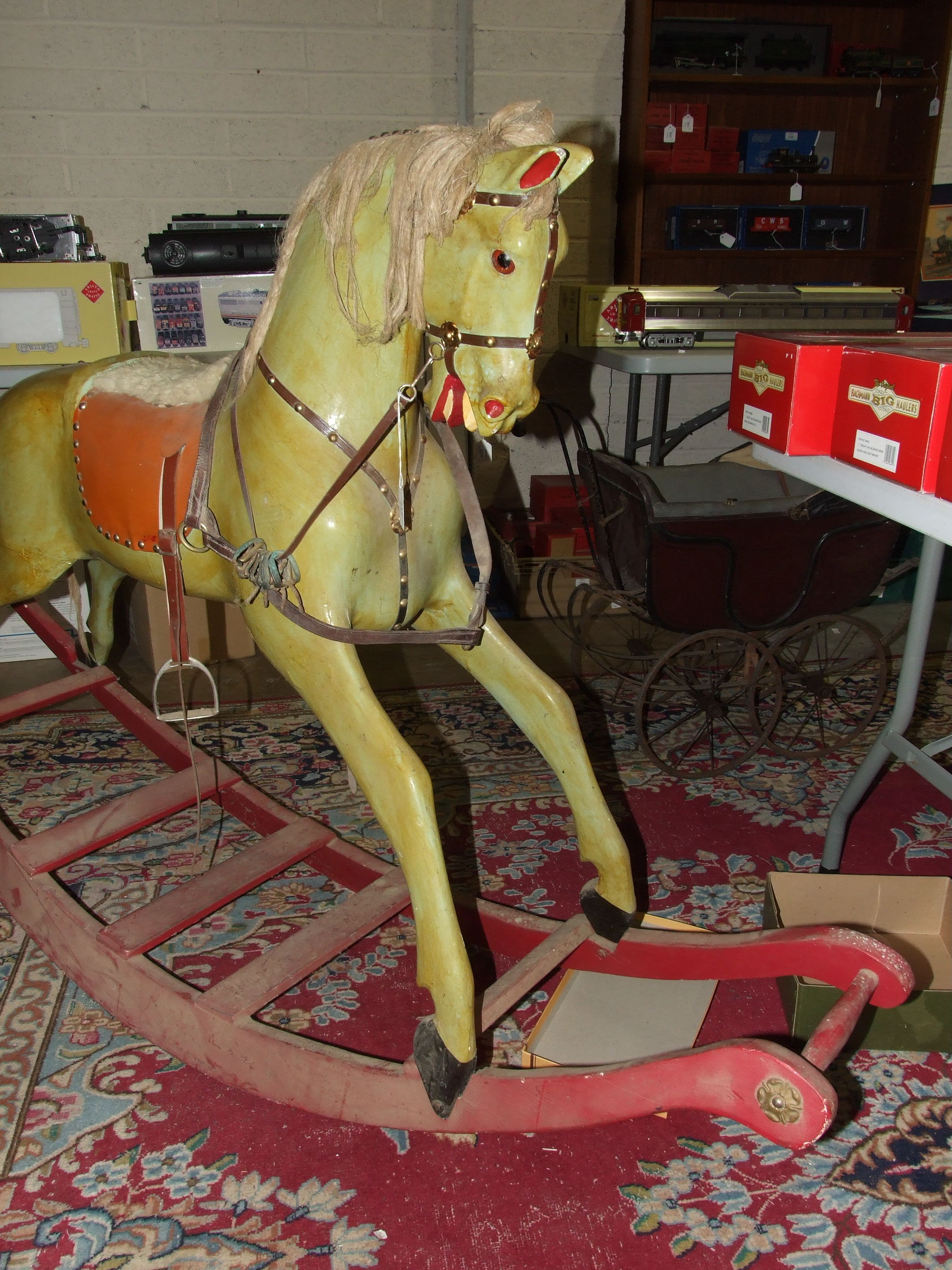 An early-20th century painted wood rocking horse on painted sleigh base and fitted with leather - Image 3 of 4