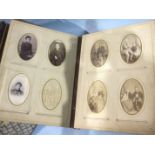 An album of 60 cartes de visite, an empty cartes de visite album with mother-of-pearl cover and