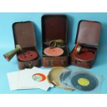 Three mid-20th century German children's portable gramophones and a quantity of Walt Disney,