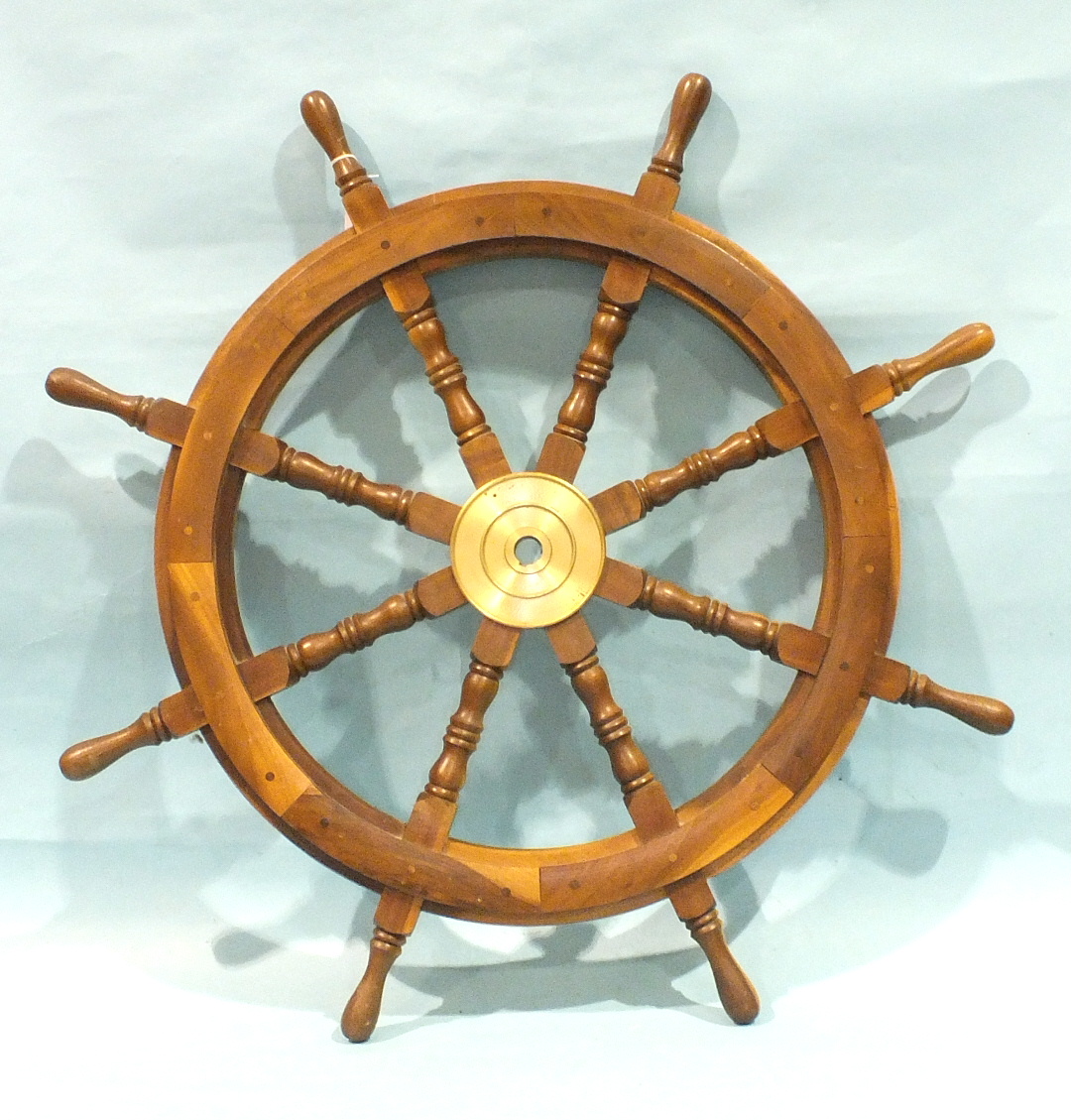 An eight-spoke hardwood ship's wheel, 93cm.