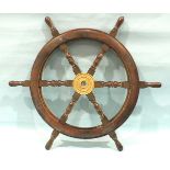 A six-spoke ship's wheel, 76cm diameter.