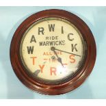 A circular mahogany cased advertising wall clock, the dial marked Warwick Tyres, Ride Warwicks All