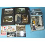 A collection of approximately 470 loose, mainly UK, topographical cards and an album of