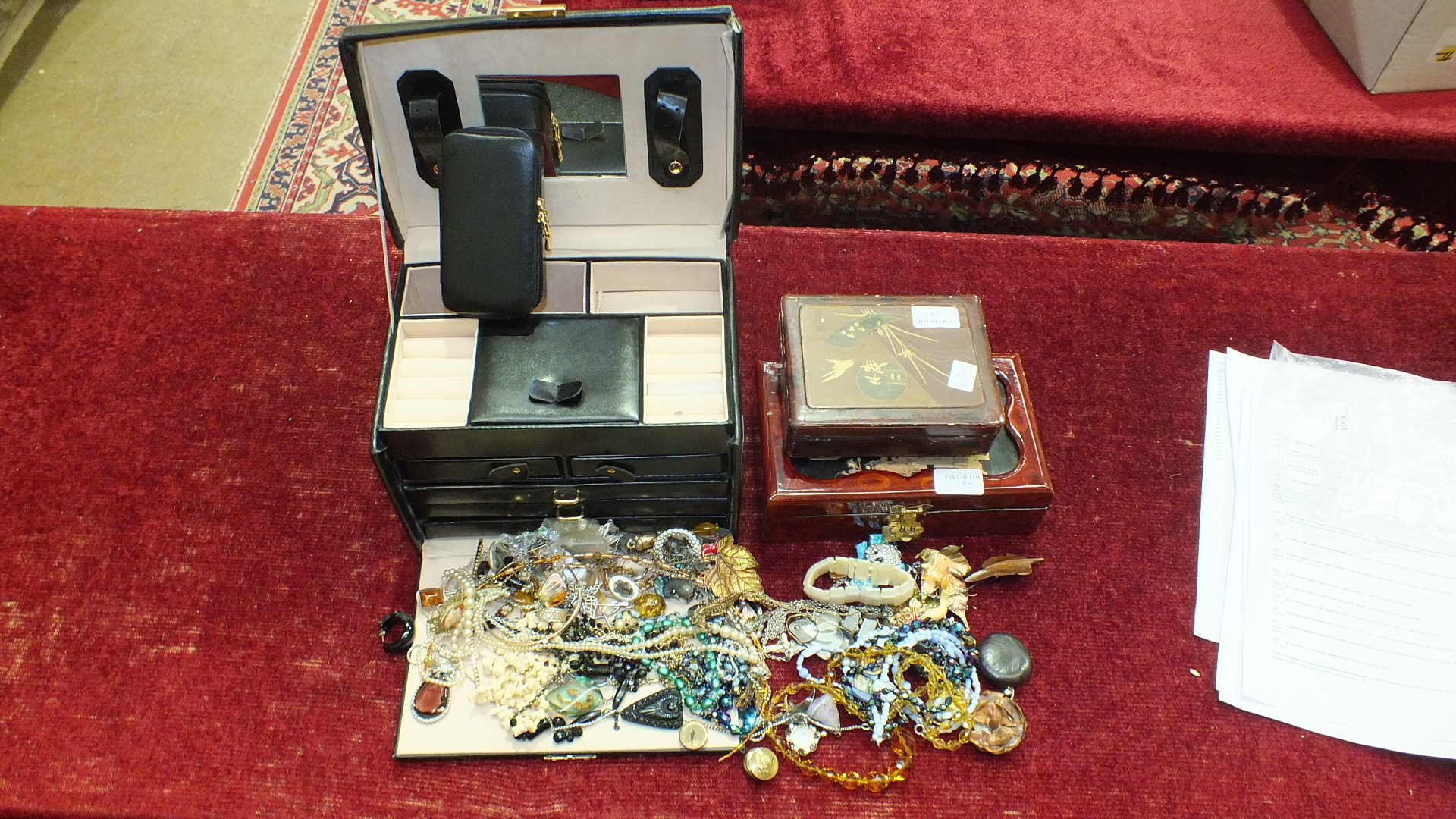 A quantity of costume jewellery and three jewellery boxes.