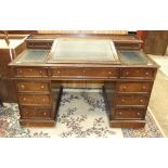 A 19th Century oak estate desk having two small drawers and central writing slope with fitted