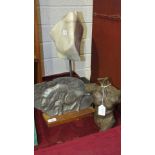 An alabaster sculpture on slate base and two other sculptures.