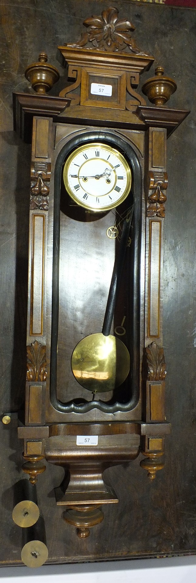 A late-19th century Vienna wall clock with striking movement, 100cm high, (door glass lacking).