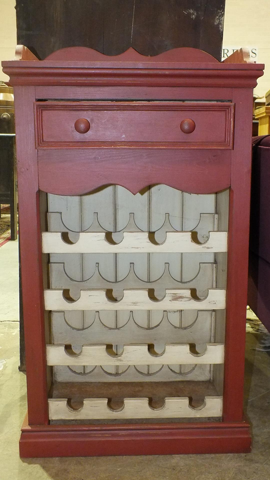 A modern painted wood wine rack/cabinet, the top with inset marble, above a single drawer, 53cm