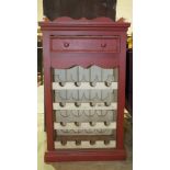 A modern painted wood wine rack/cabinet, the top with inset marble, above a single drawer, 53cm